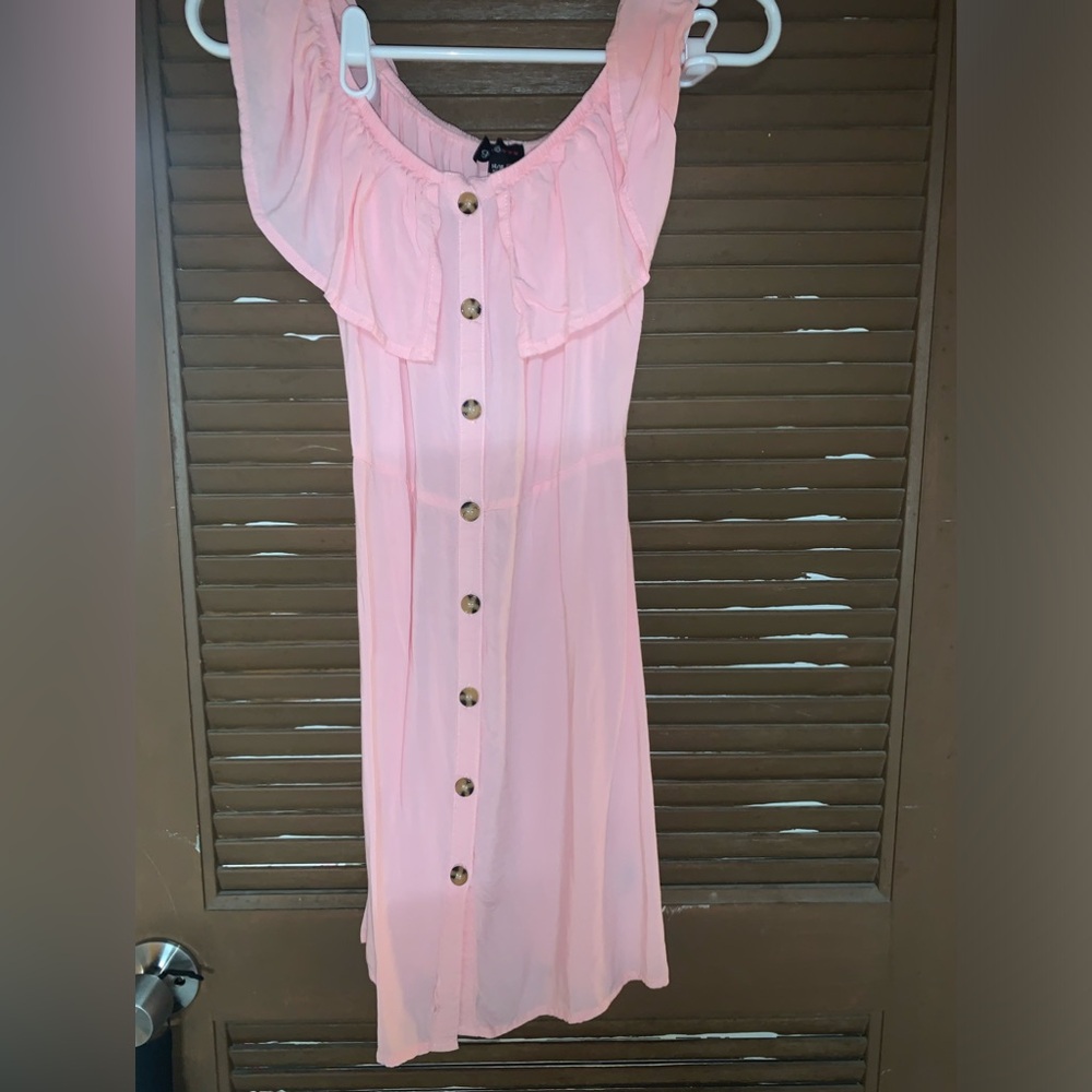 A cute pink dress perfect for spring or summer!